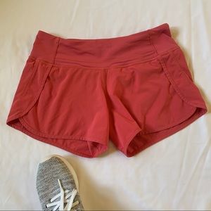 Pink running shorts